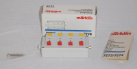 Märklin 7274 Schaltpult zum Verteilen eines Bahn- oder Lichtstromkreises auf 4 verschiedene Leitungen mit je 2 Anschlüssen.