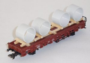 Märklin 4694 H0 Rungenwagen Rlmms 58 beladen mit Betonformteilen, DB